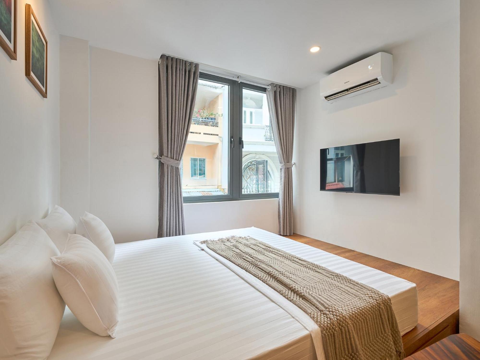 Căn hộ Horizon Bui Vien Retreat - Exclusive Rooftop & Poolside Relaxation