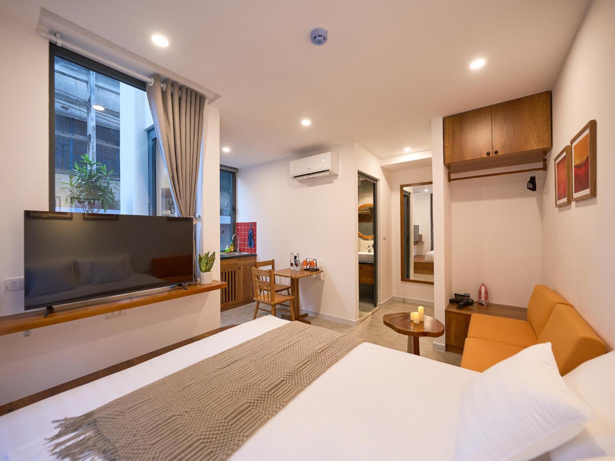 Căn hộ Horizon Bui Vien Retreat - Exclusive Rooftop & Poolside Relaxation